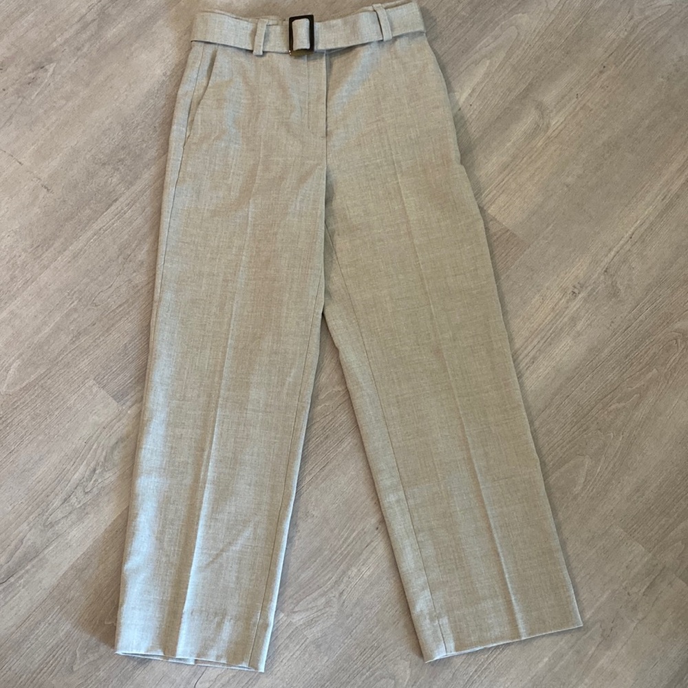 Beige dress pants with waist buckle